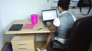A young secretary gets fucked by her boss directly at her workplace