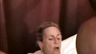 A black guy fucks a pretty woman who is over 50 years old