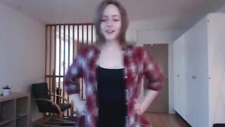 The girl plays with a big dildo, imitating sex with her thick pussy