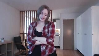 The girl plays with a big dildo, imitating sex with her thick pussy