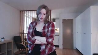 The girl plays with a big dildo, imitating sex with her thick pussy