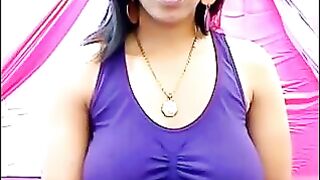 The nipples of the excited brunette stick out through her T-shirt