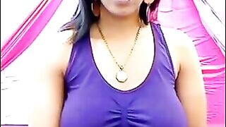 The nipples of the excited brunette stick out through her T-shirt