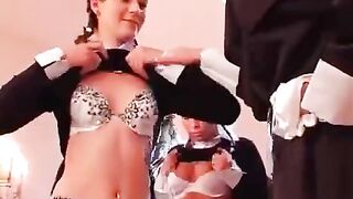 Three girls are having fun with a nun who used to be promiscuous