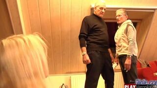 A young blonde has sex with her bearded gray-haired lover