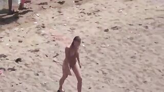 A pair of lovers have fun directly in the sea without any clothes