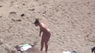 A pair of lovers have fun directly in the sea without any clothes