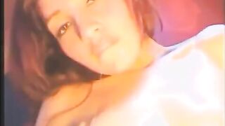 The girl has sex with a vibrator in all her holes at once