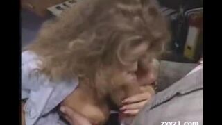 The teacher with big tits is trying to seduce her student in the classroom