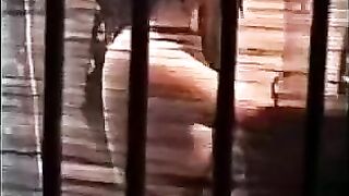 A guy carefully licks the hairy lips of a girl’s pussy