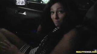 A brunette woman gets a cum shot on her face during sex