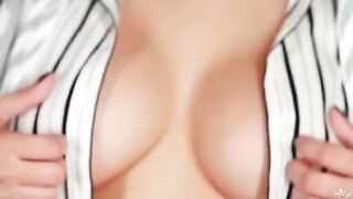 Beautiful girl with big natural boobs playing with them