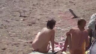Two hot girls are taking a bath in the sea naked