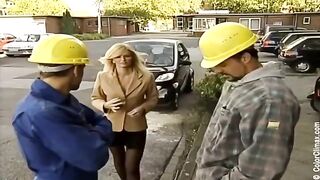 A hot girl in black pantyhose gets a dick in her mouth on the porn set