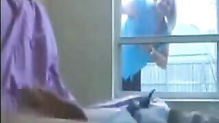 A woman peeps on a man jerking off in the ward
