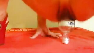 Fisting with a bottle and large dildo, intense solo action