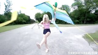 A girl is having fun with nature and a young guy