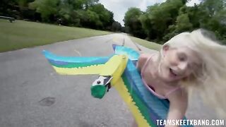 A girl is having fun with nature and a young guy