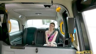 A guy fucks a girl and makes her groan in the car