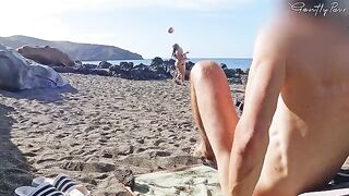 Two girls almost got caught jerking off on the nude beach