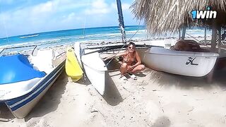 A young cute couple enjoy passionate sex on the beach