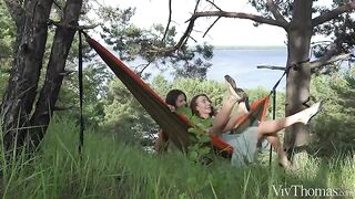 The lesbian beauties get a tan in nature