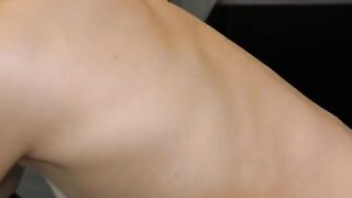 A cute girl in the kitchen has a gymnastic sex session with her boyfriend