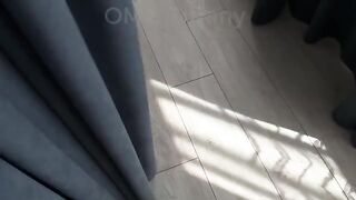 A cutie is rolling on the sheet like a crazy one, with a dick underneath her — just as she desires