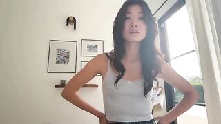 Asian tutor tries out all three holes of her student