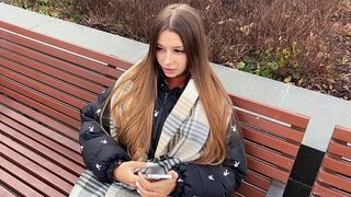 A cute girl is risking her body for money outdoors