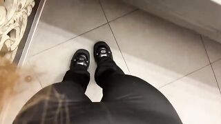 A stunning Russian girl with a captivating presence in the restaurant bathroom